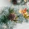 Glitzhome® 9ft. Pre-Lit Greenery Pinecones & Red Berries Christmas Garland